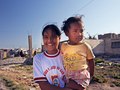 Pisco, Peru. Two girls together