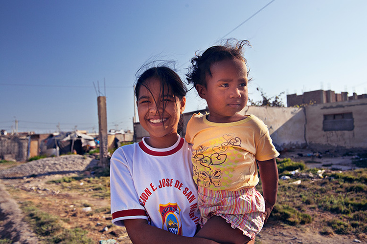 Pisco, Peru. Two girls together