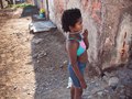curious young girl, Pisco, Peru