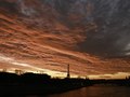Fiery sky during sunset in the capital. Paris 1er, France.