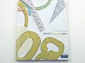 A variety of cut-out papers were used to create the cover of the project catalogue. Art Direction by Brett Lamb.
