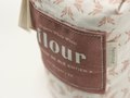 The flour package unfolds into a tea towel.