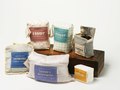 A line of packaging that is designed to avoid waste by having the packages unfold into new items.