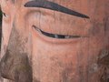 The weathered Leshan Giant Buddha in Sichuan, China, is showing signs of wear and tear.