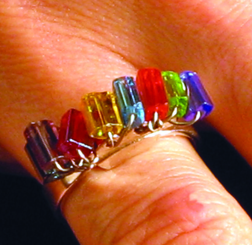 Multi-colored glass bead ring
