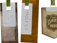 Garment Hangtags as Study Vehicle for Branding of New, Top-tier Clothing Line. Materials include wood, leather, fabric, metals