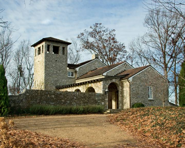 The house is on a very high hill up a driveway with 6 switchbacks and a vertical drop of 500 feet.