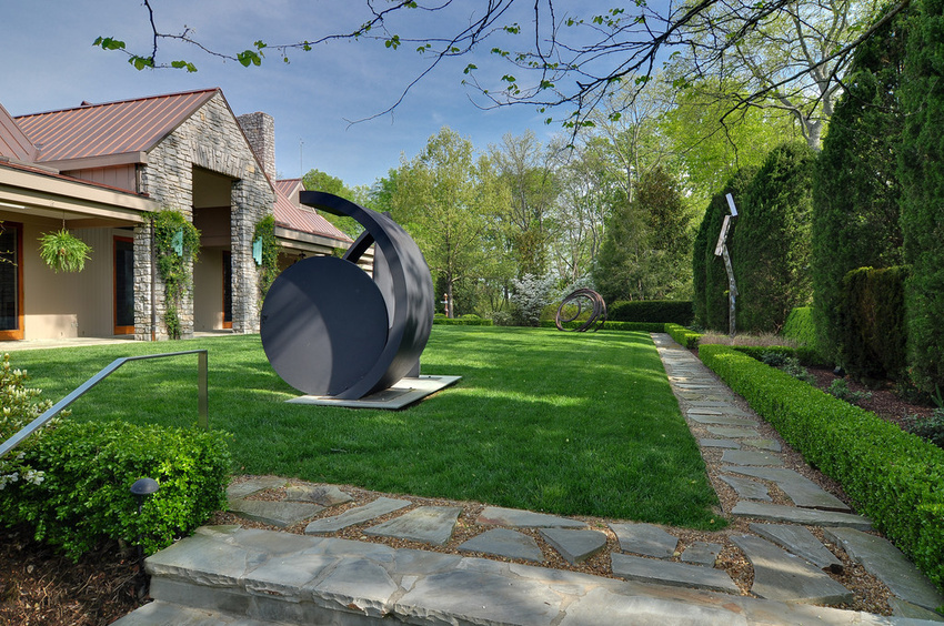 A landscape designed for sculptures is itself a collection of horticultural sculptures.