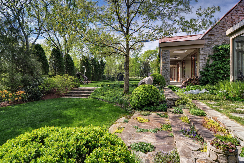 A landscape designed for sculptures is itself a collection of horticultural sculptures.