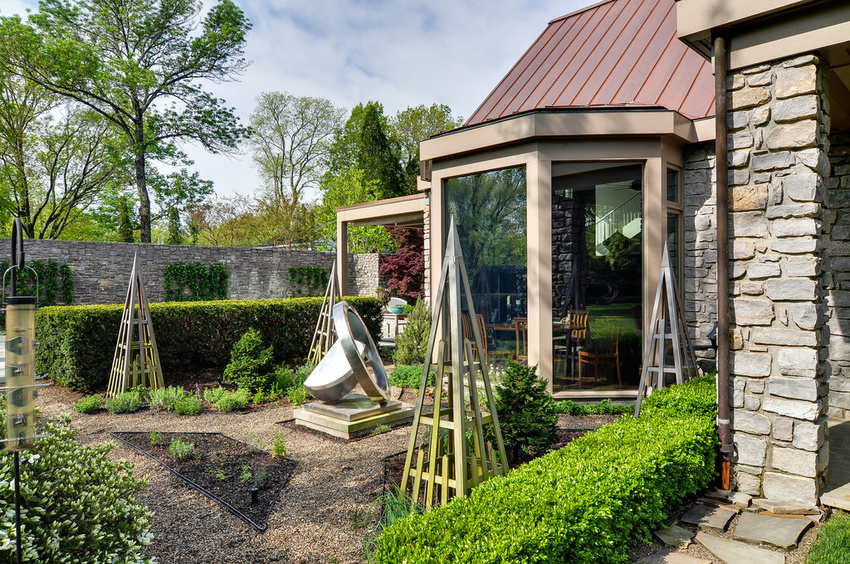 A landscape designed for sculptures is itself a collection of horticultural sculptures.