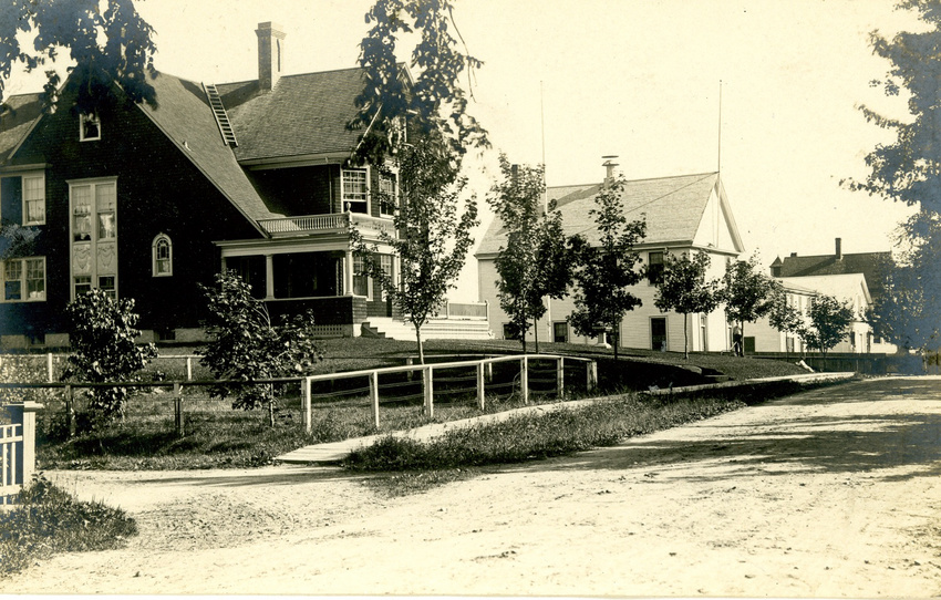 A photo circa 1905 showing all the porches and details that were original. Look closely and you will see Mr. Pope cutting the grass with his son laying nearby.